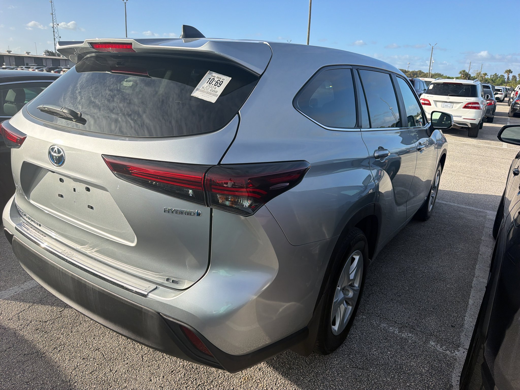 Used 2024 Celestial Silver Metallic Toyota Hybrid LE image 7