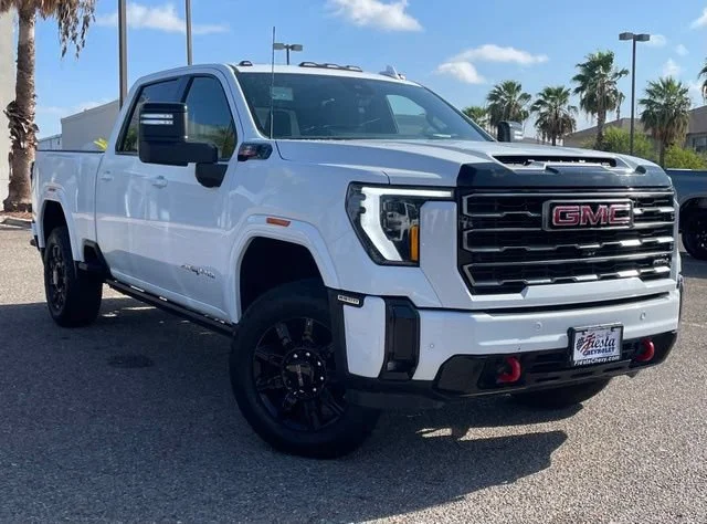 Used 2025 Summit White GMC AT4 image 1