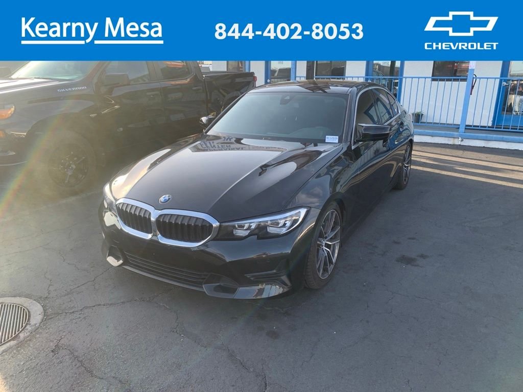 Used 2020 Black BMW 330i image 1