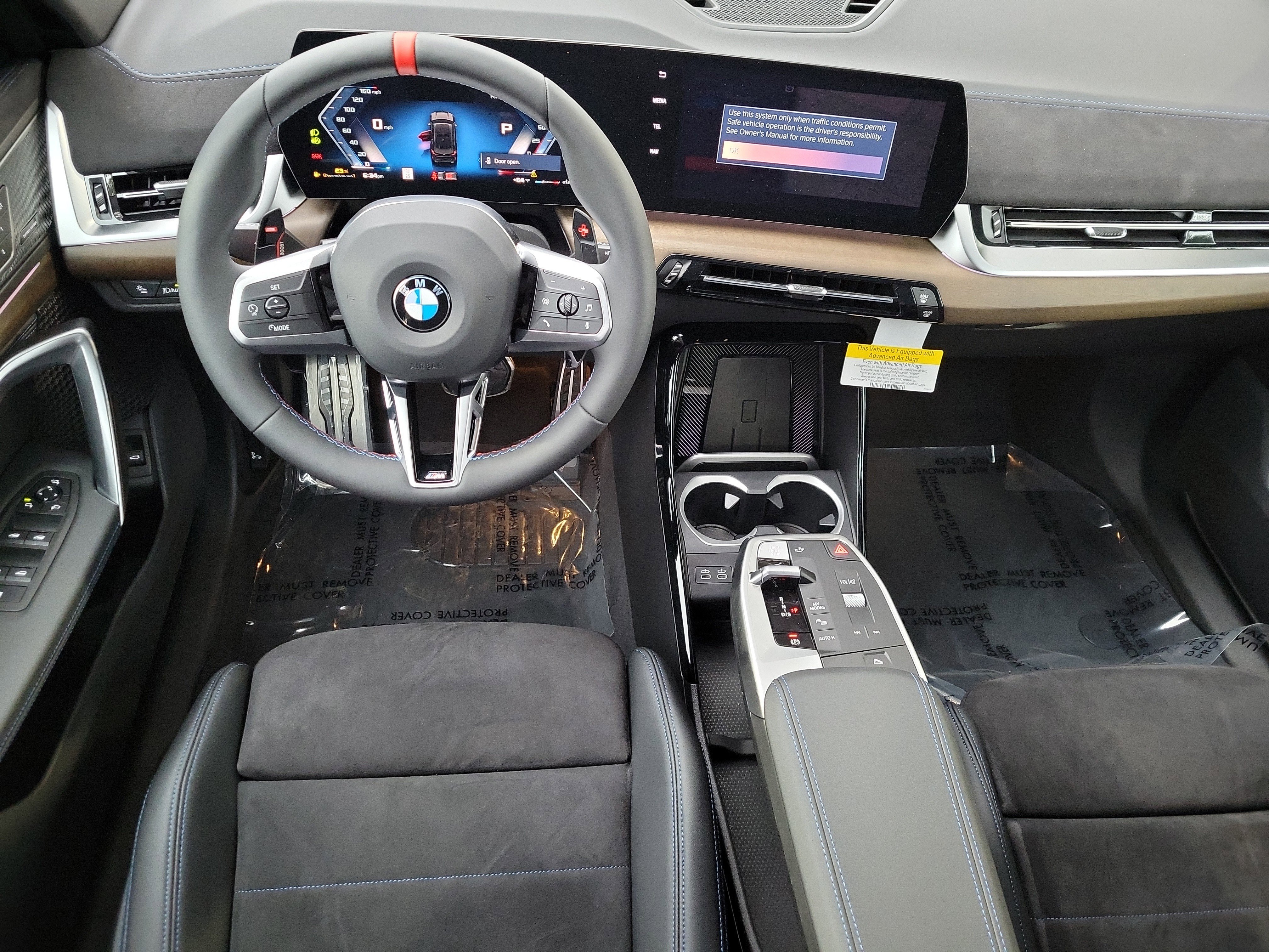 New 2026 Black Sapphire Metallic BMW M35i image 8