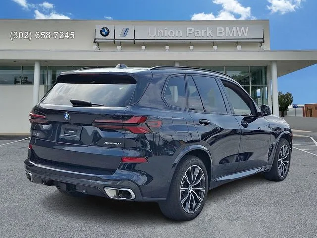 Certified Used 2024 Carbon Black Metallic BMW xDrive40i image 4