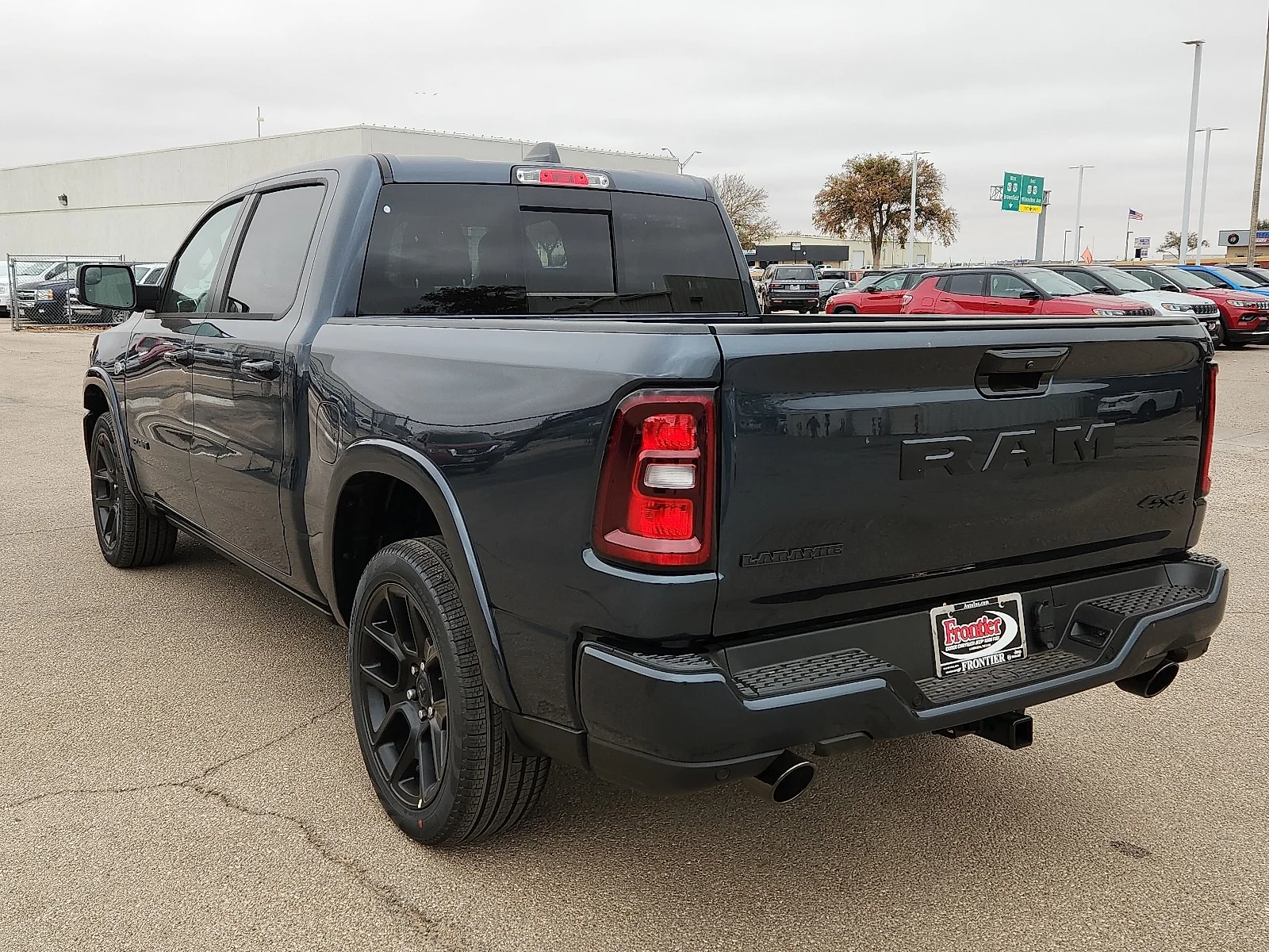 New 2026 Forged Blue Metallic  Paint Ram LARAMIE CREW CAB 4X4 5