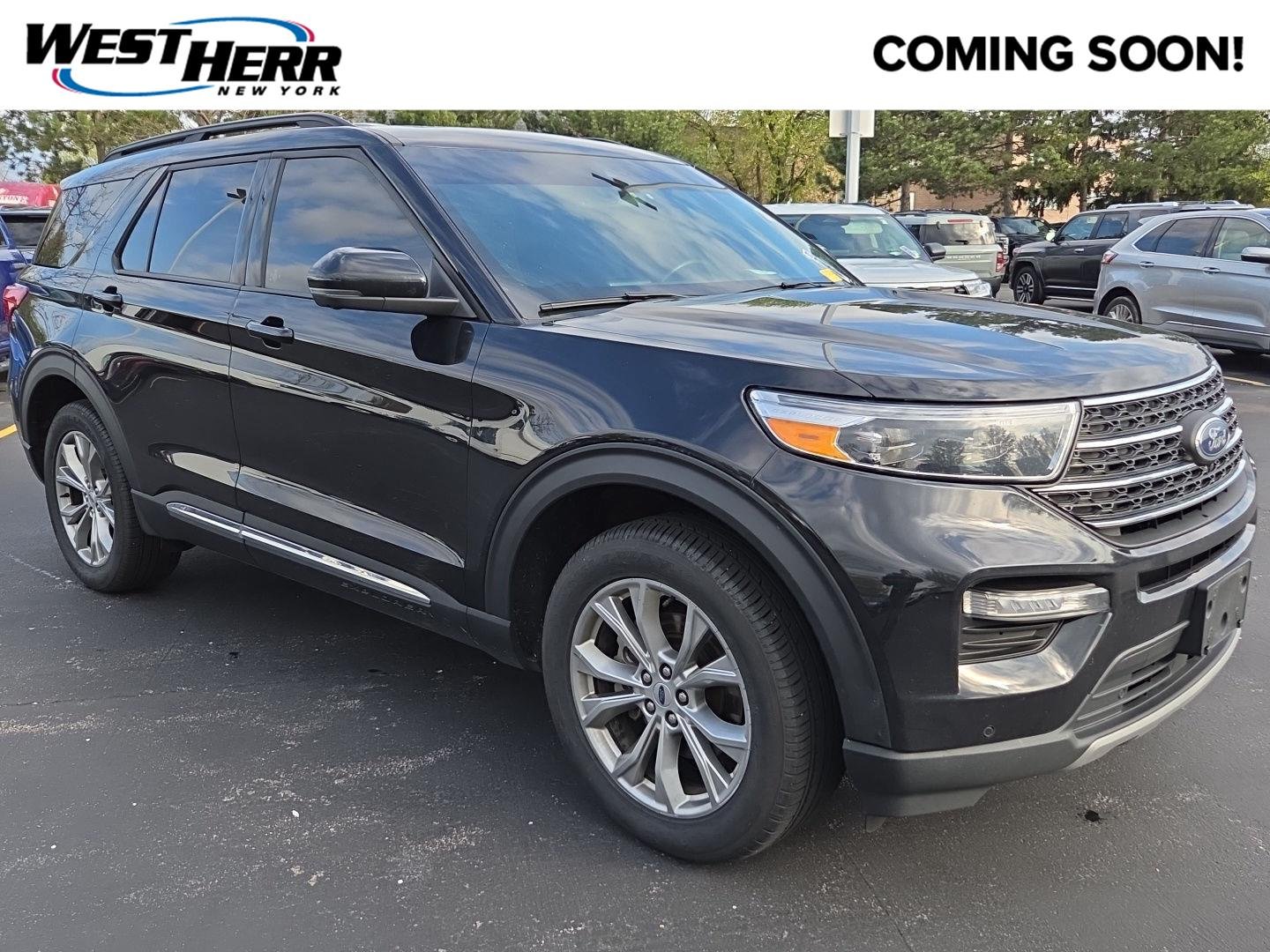 Used 2023 Agate Black Metallic Ford XLT image 1