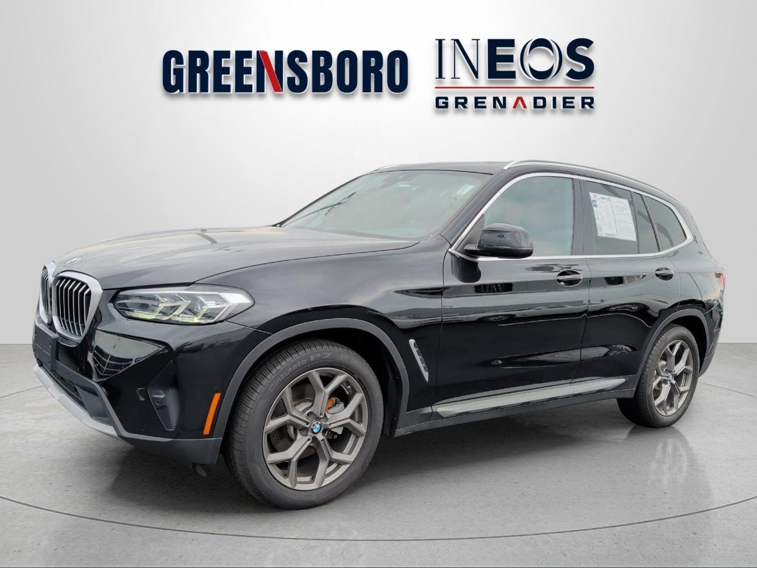Used 2022 Black Sapphire Metallic BMW xDrive30i image 1