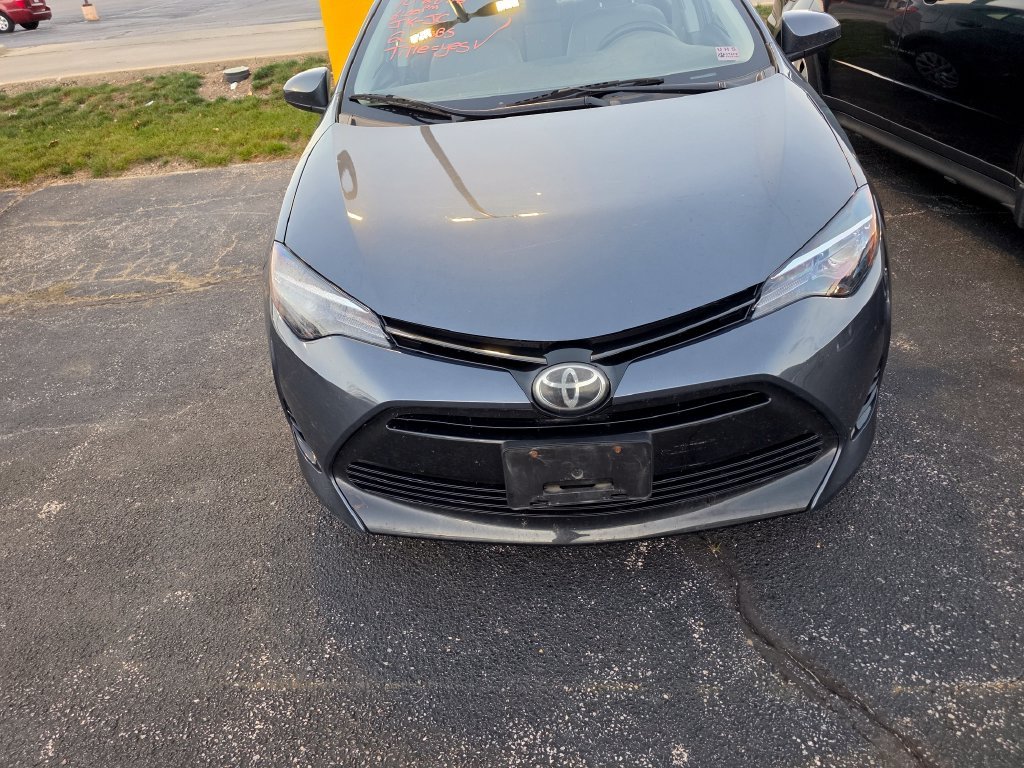 Used 2017 Slate Metallic Toyota LE image 1
