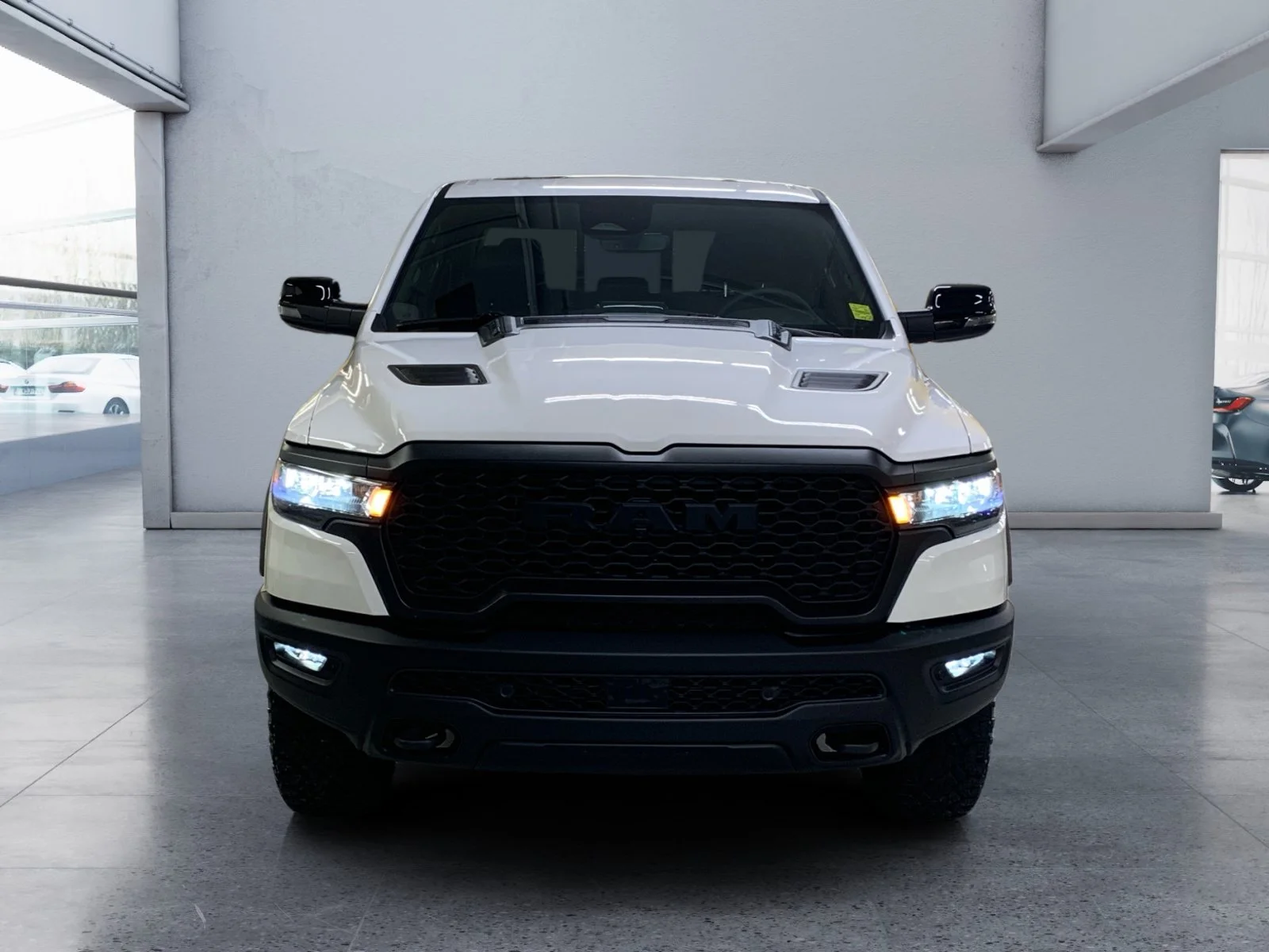 New 2026 Bright White Ram Rebel image 8