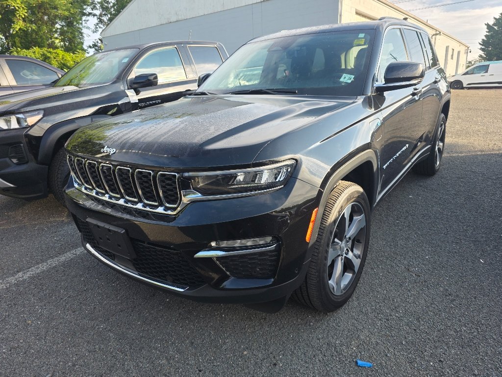 Used 2023 Diamond Black Crystal Pearl Coat Jeep 4xe image 1
