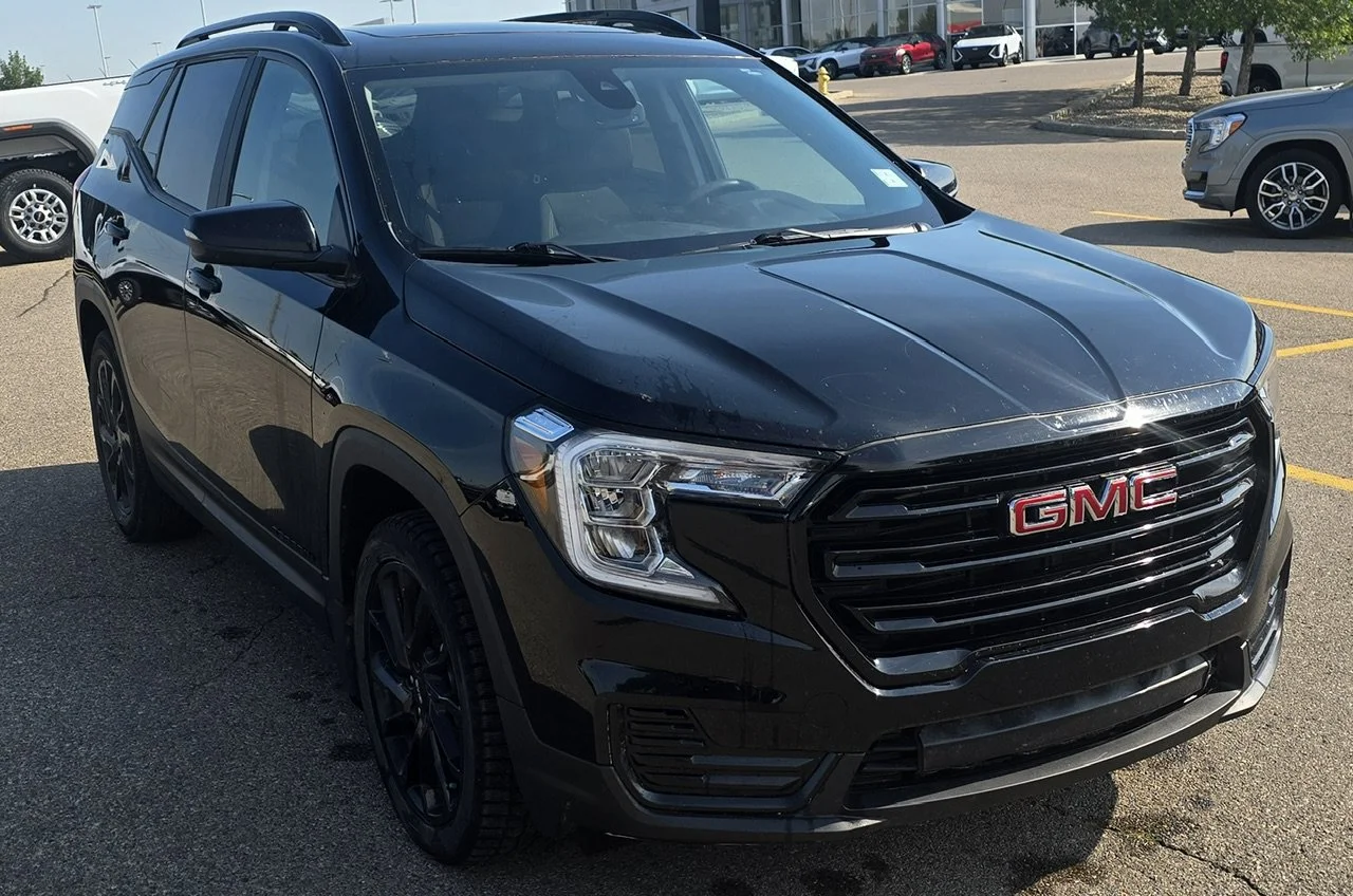 Used 2024 Black GMC SLE AWD image 7