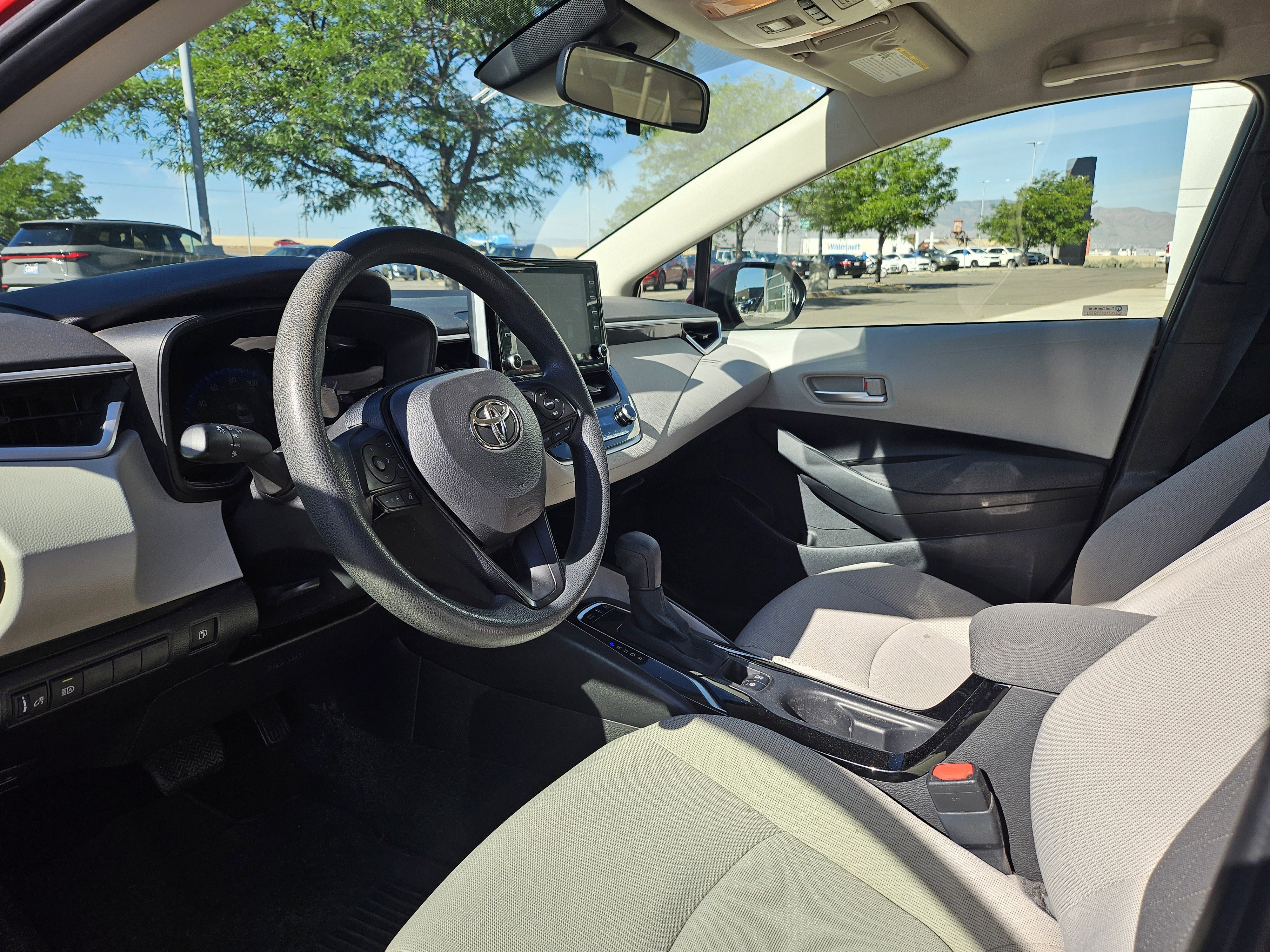 Used 2021 Barcelona Red Metallic Toyota LE image 10