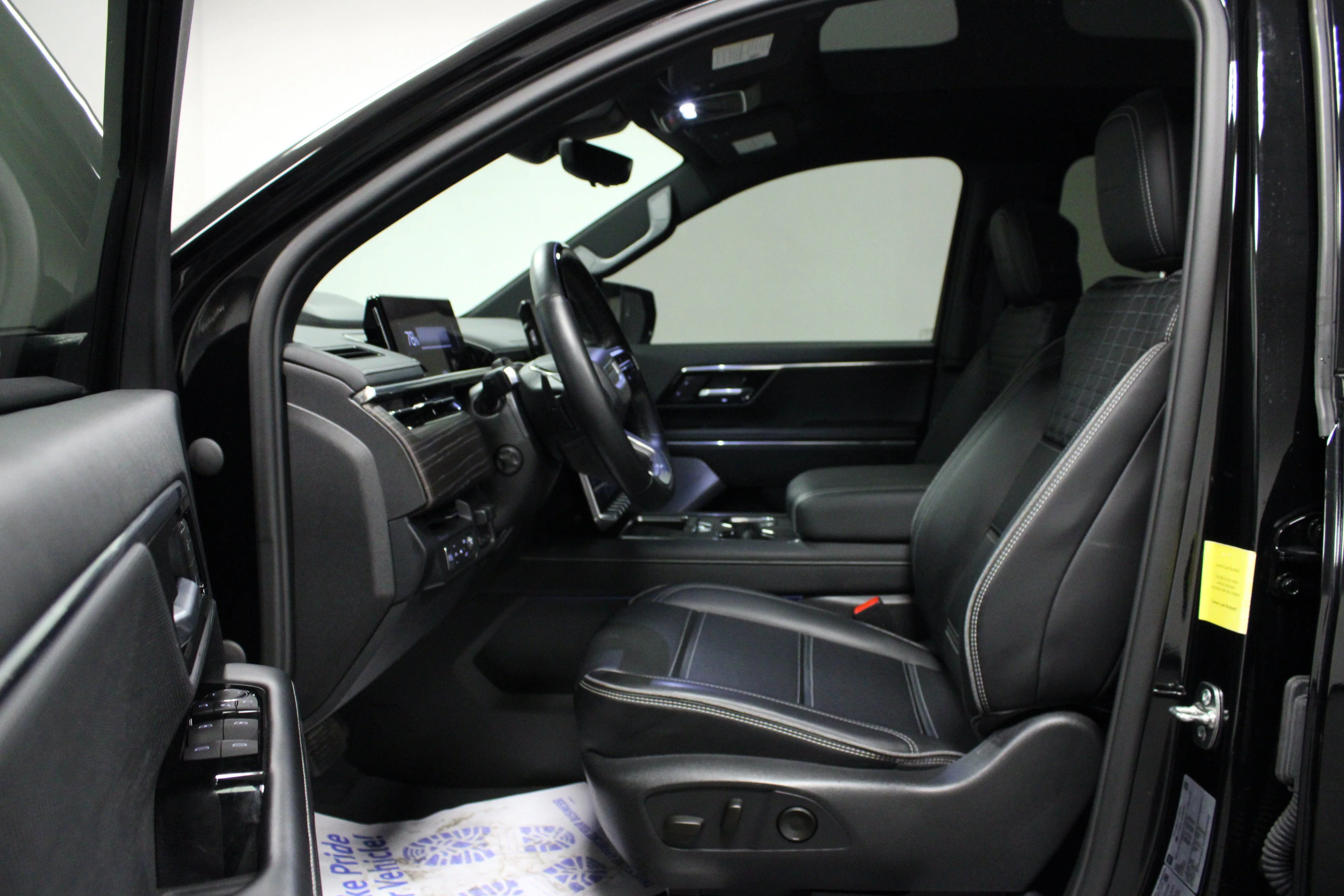 Used 2025 Onyx Black GMC Max Range Denali image 12