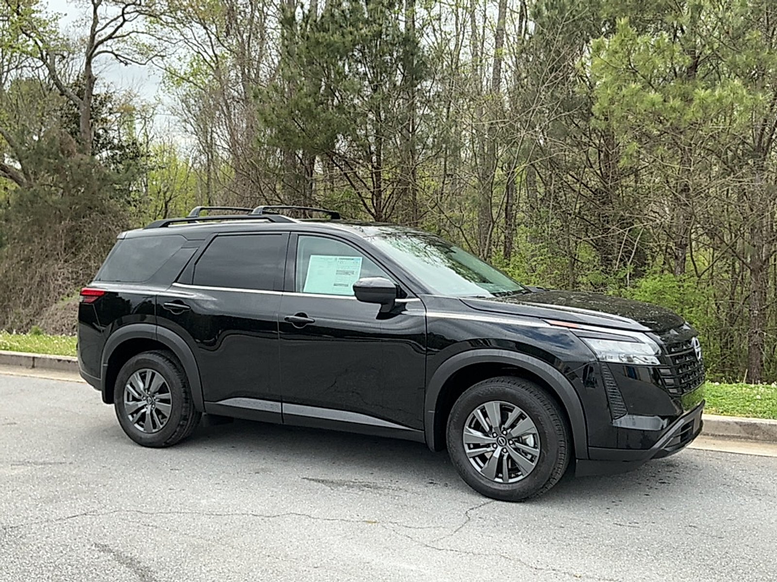 New 2026 Super Black Nissan SV image 1