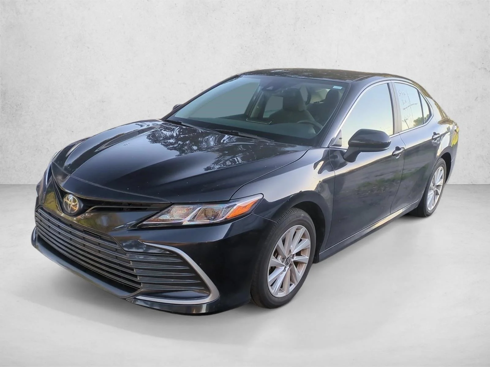 Used 2024 Midnight Black Metallic Toyota LE image 1