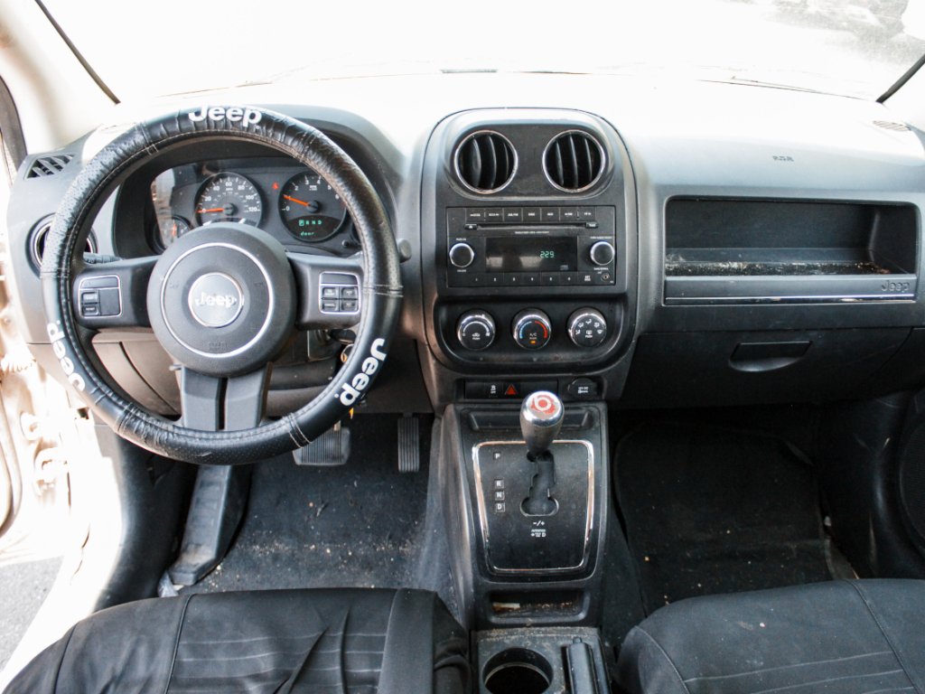 Used 2012 Bright Silver Metallic Clearcoat Jeep Sport image 19