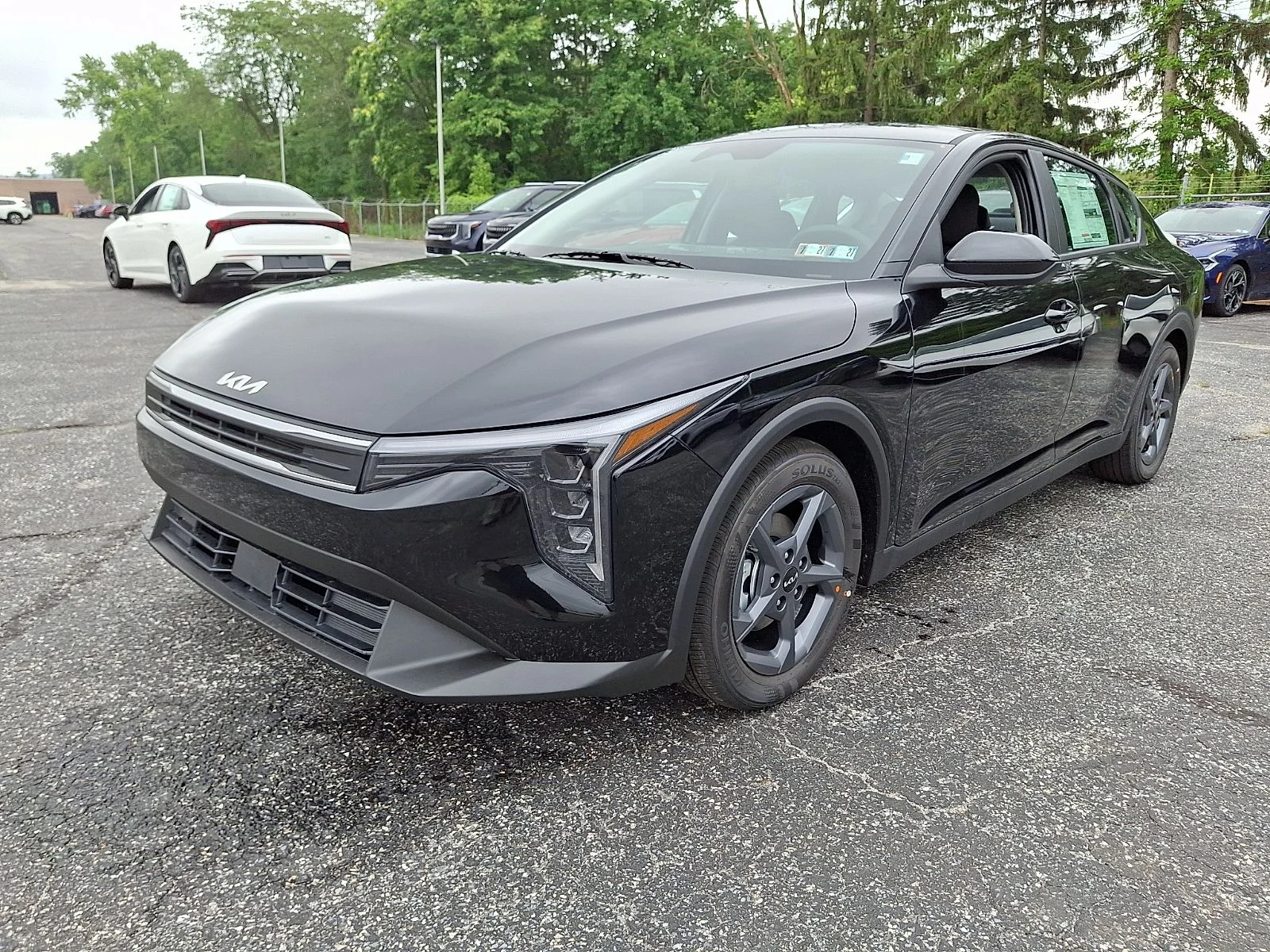New 2026 Black Kia LXS image 4