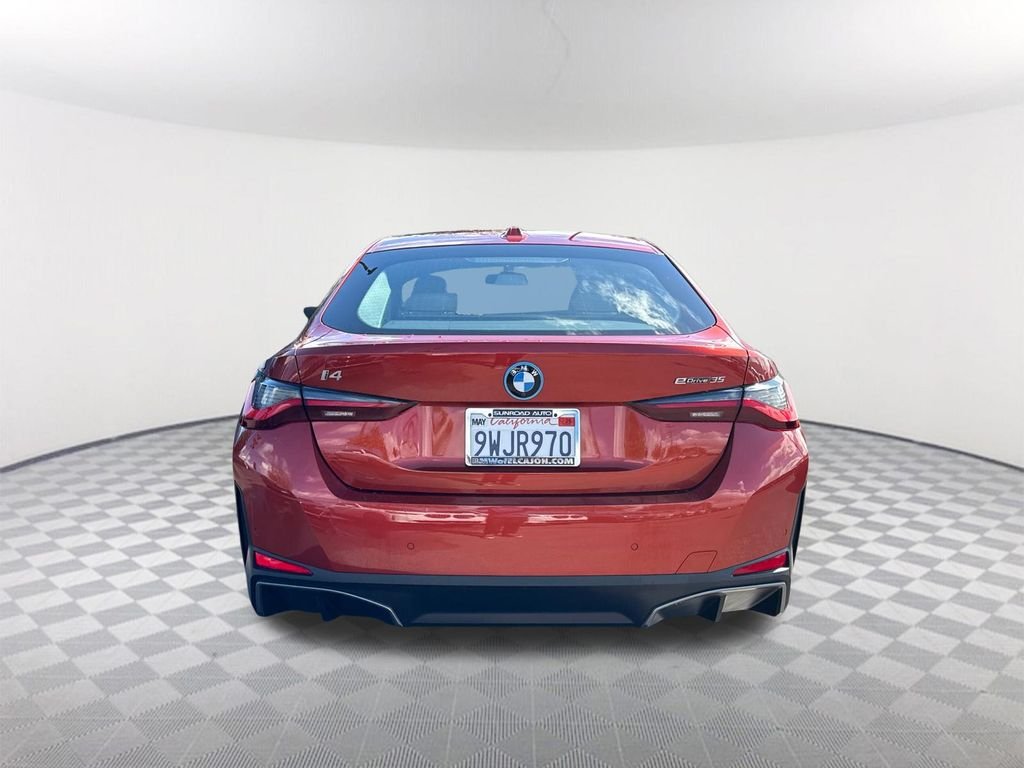 Certified Used 2023 Sunset Orange Metallic BMW eDrive35 image 5