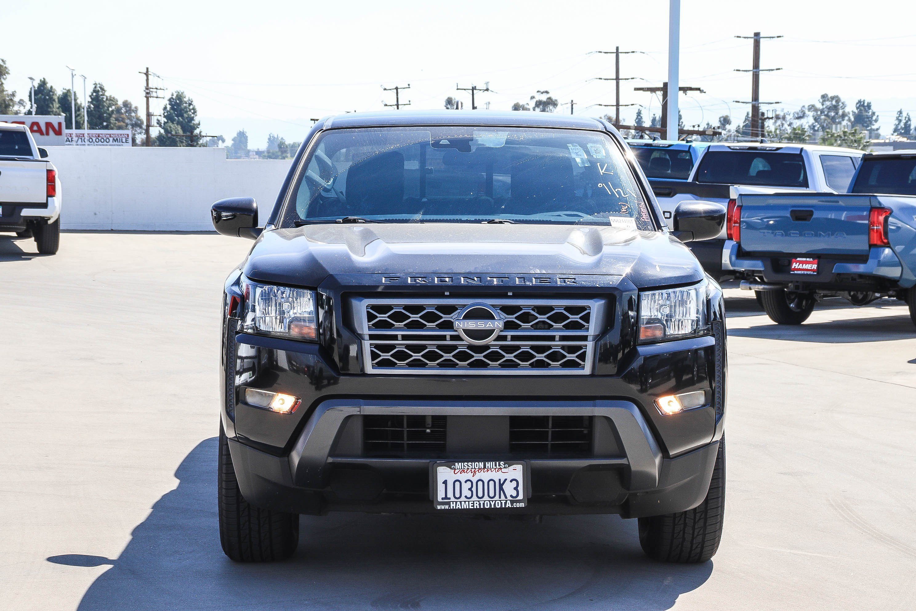 Used 2022 Super Black Nissan SV image 2