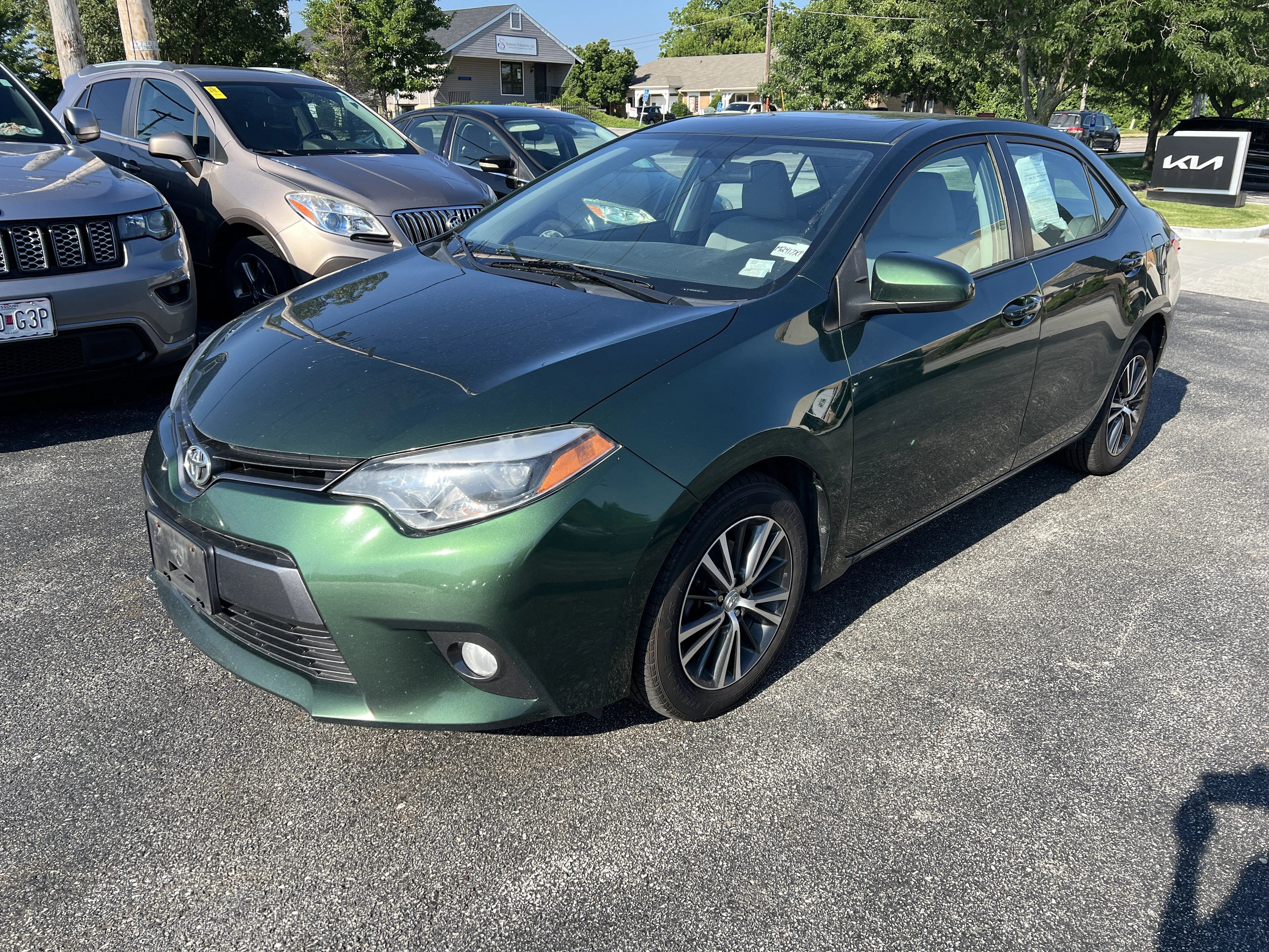 Used 2016 4evergreen Metallic Toyota LE Plus image 4