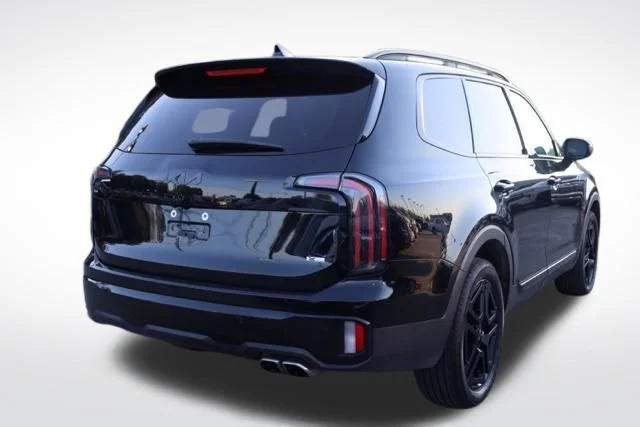 Used 2025 Black Kia EX X-Line image 14