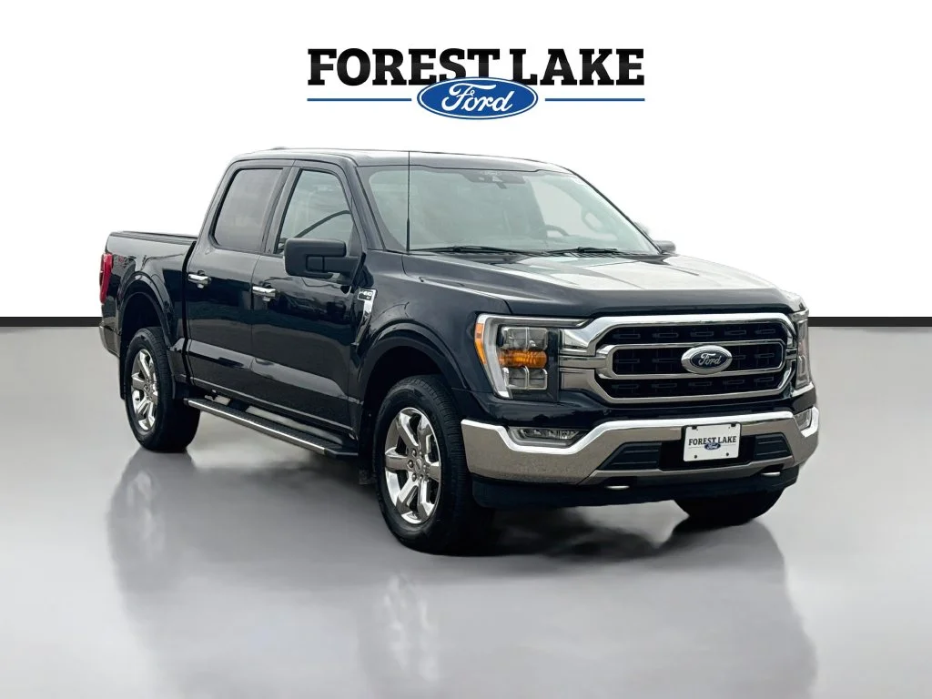 Certified Used 2021 Antimatter Blue Metallic Ford XLT image 1