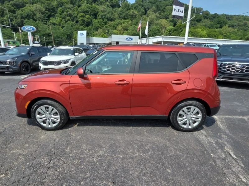 Used 2022 Orange Kia LX image 4