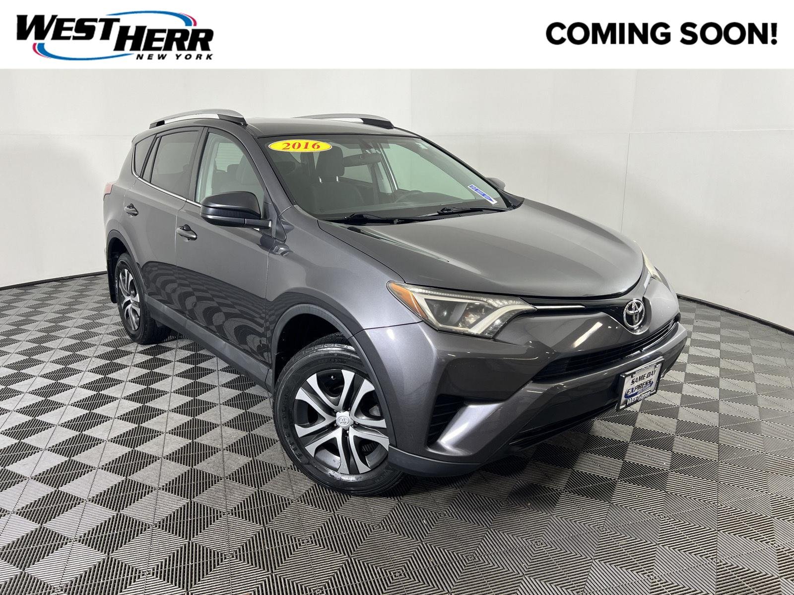 Used 2016 Magnetic Gray Metallic Toyota LE image 1
