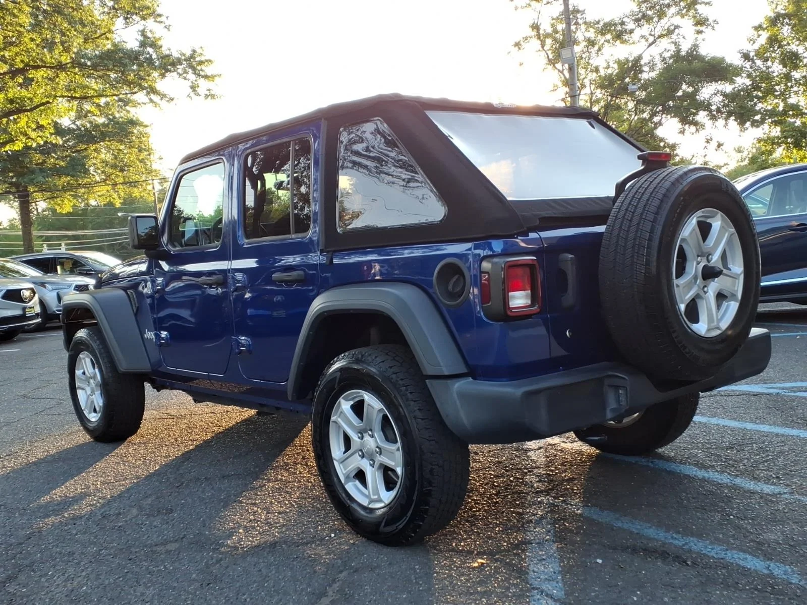Used 2020 Ocean Blue Metallic Clear Coat Jeep Sport S image 4