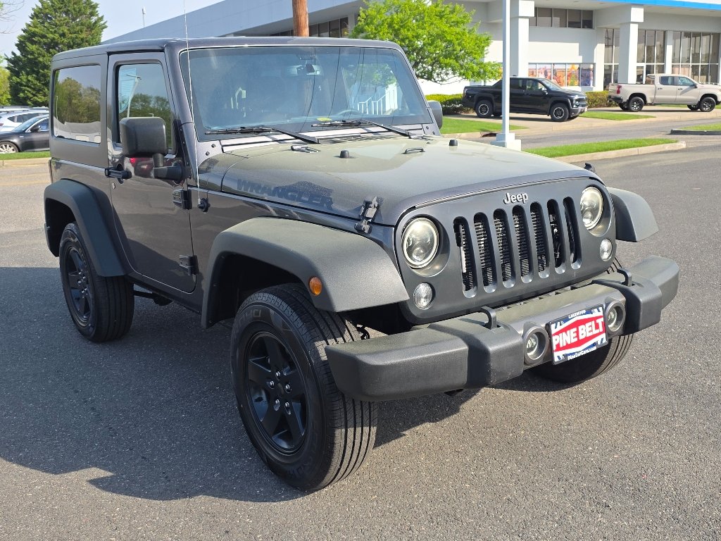 Used 2016 Granite Crystal Metallic Clear Coat Jeep Sport image 9