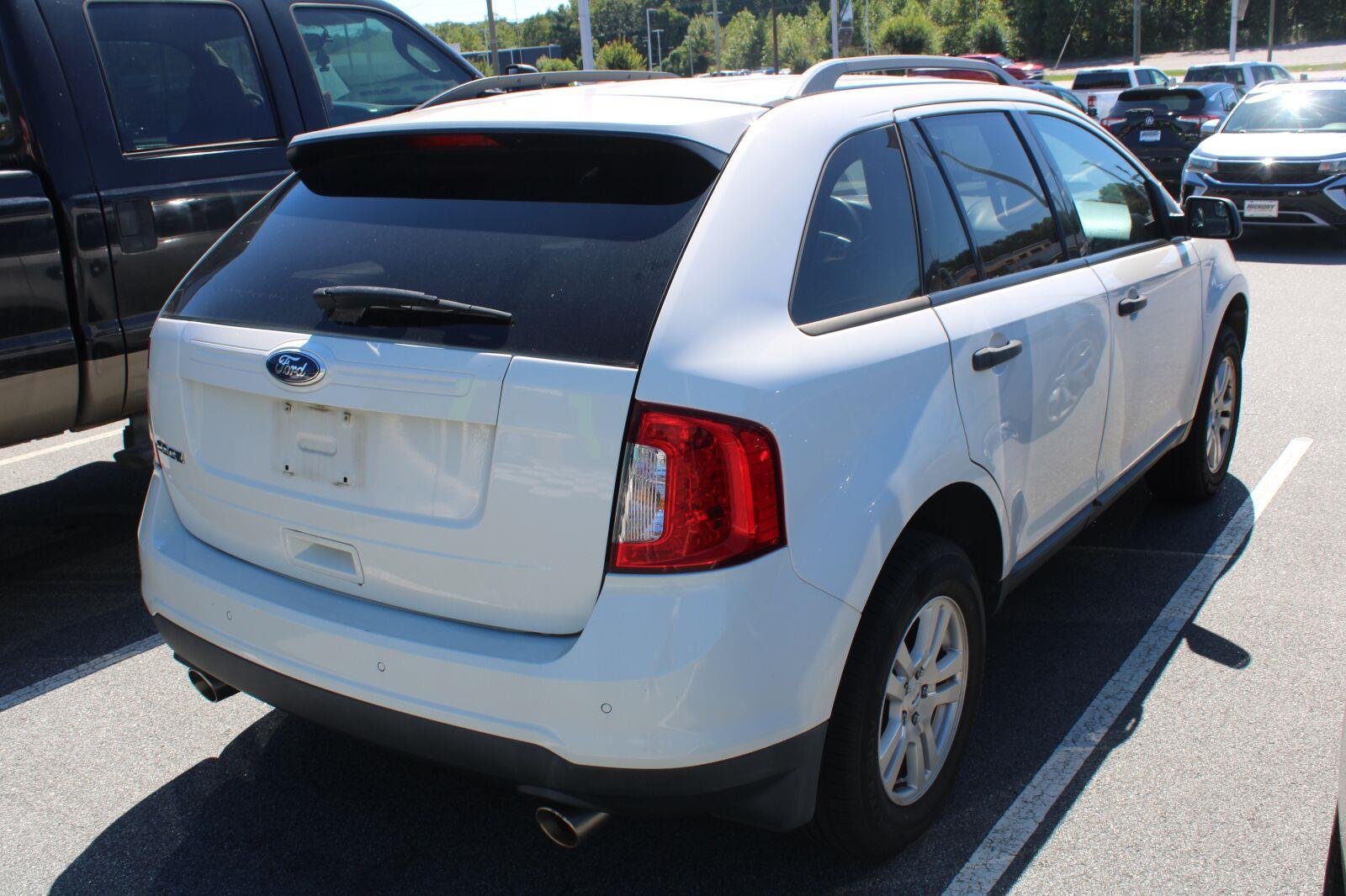 Used 2012 White Suede Ford SE image 4