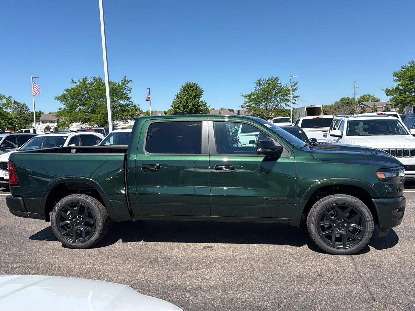 New 2026 Serrano-Green Metallic Exterior Paint RAM Laramie image 8