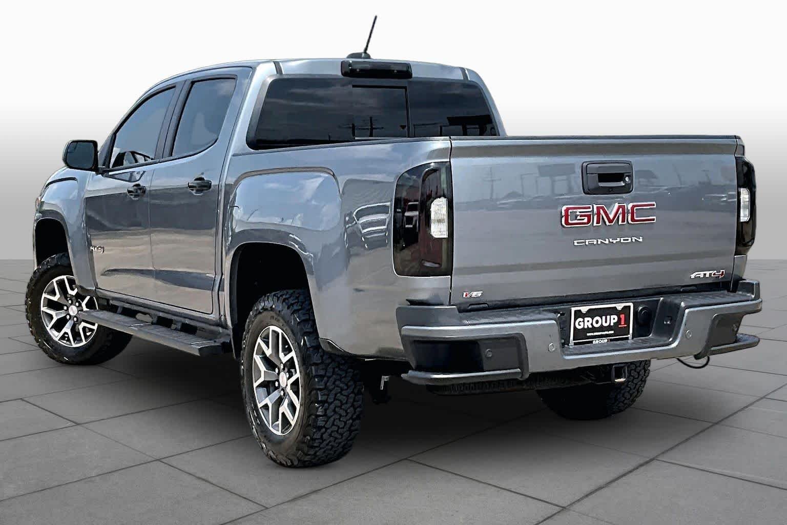 Used 2022 Satin Steel Metallic GMC 4WD AT4 w/Leather image 12