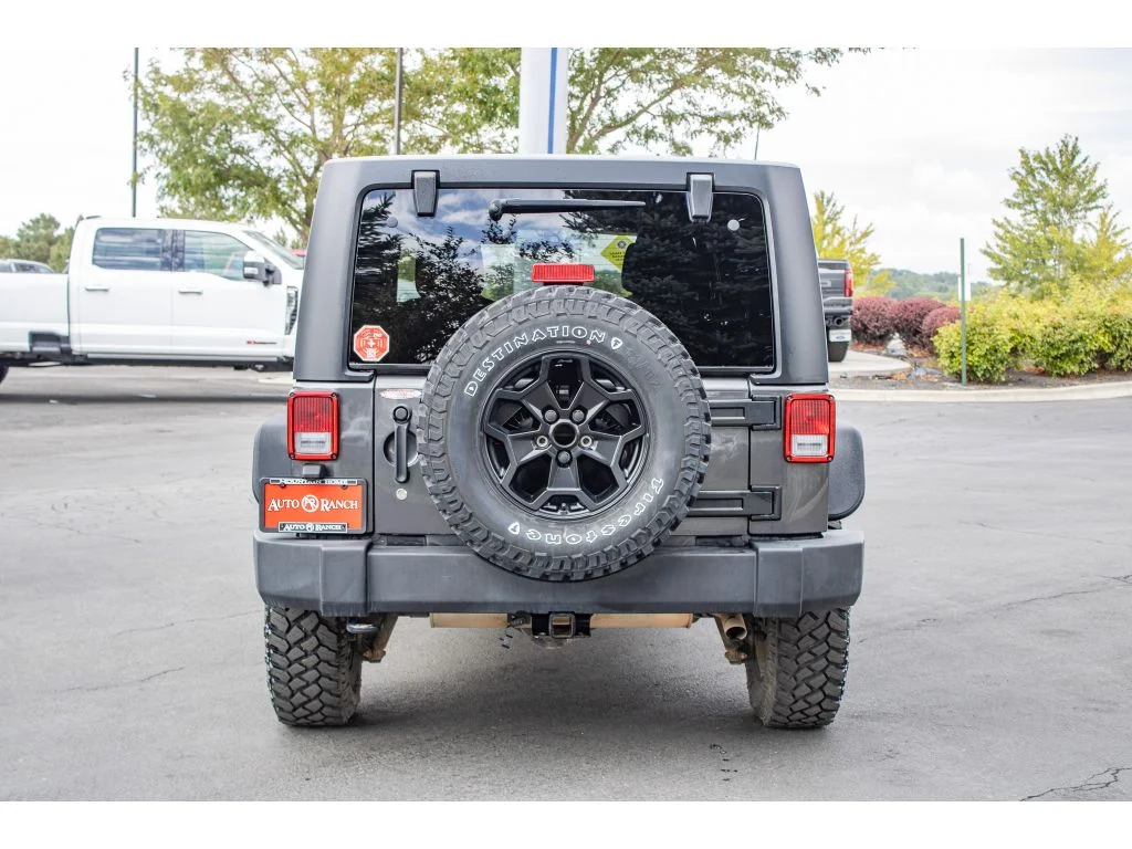 Used 2018 Granite Crystal Metallic Clearcoat Jeep Sport S image 7