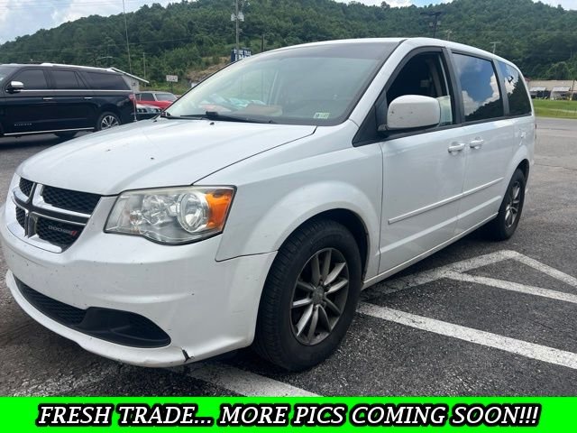 Used 2015 White Dodge SE Plus image 1