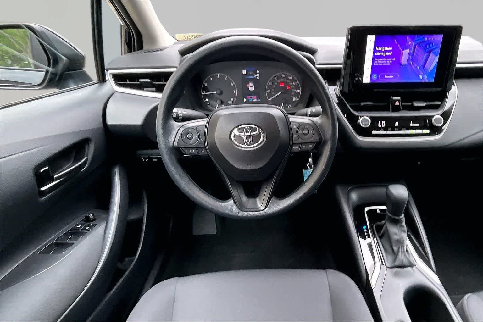 Used 2025 Midnight Black Metallic Toyota LE image 6