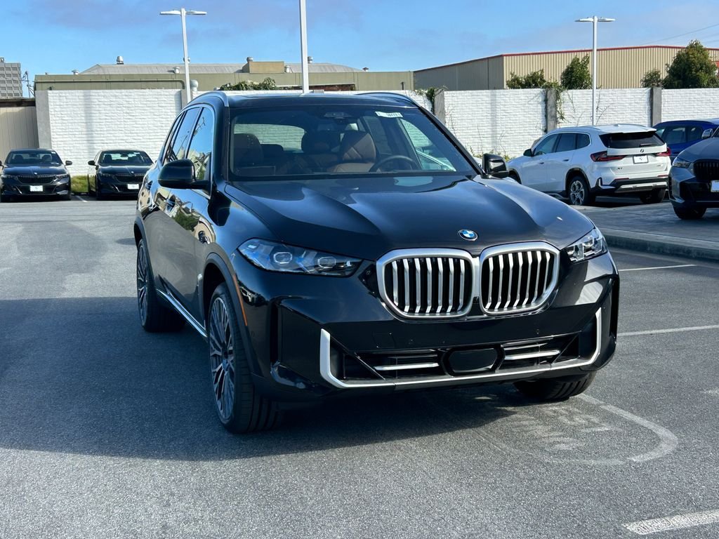 New 2026 Black Sapphire Metallic BMW xDrive40i image 7
