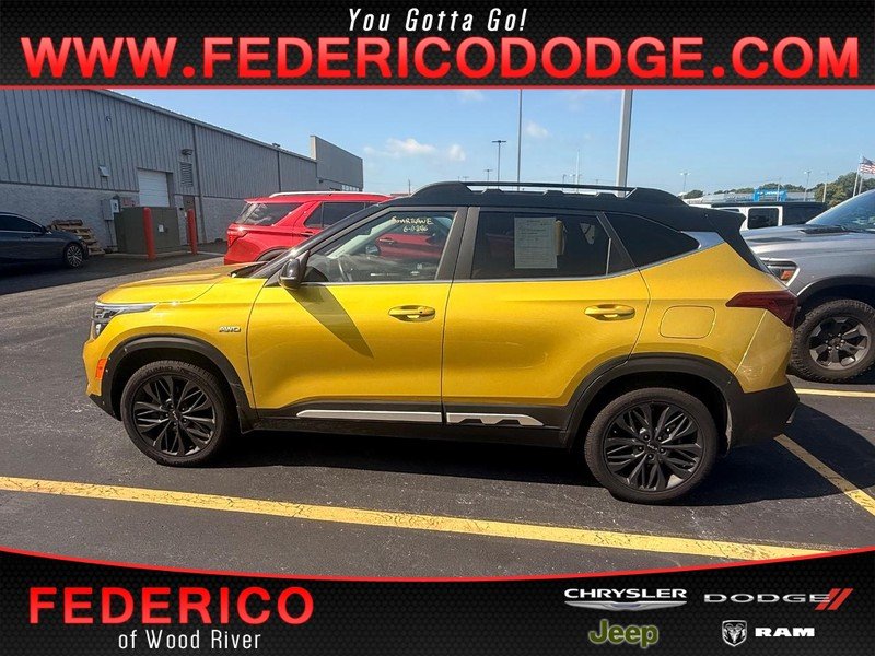 Used 2023 Starbright Yellow/Black Roof Kia Nightfall DCT AWD image 1