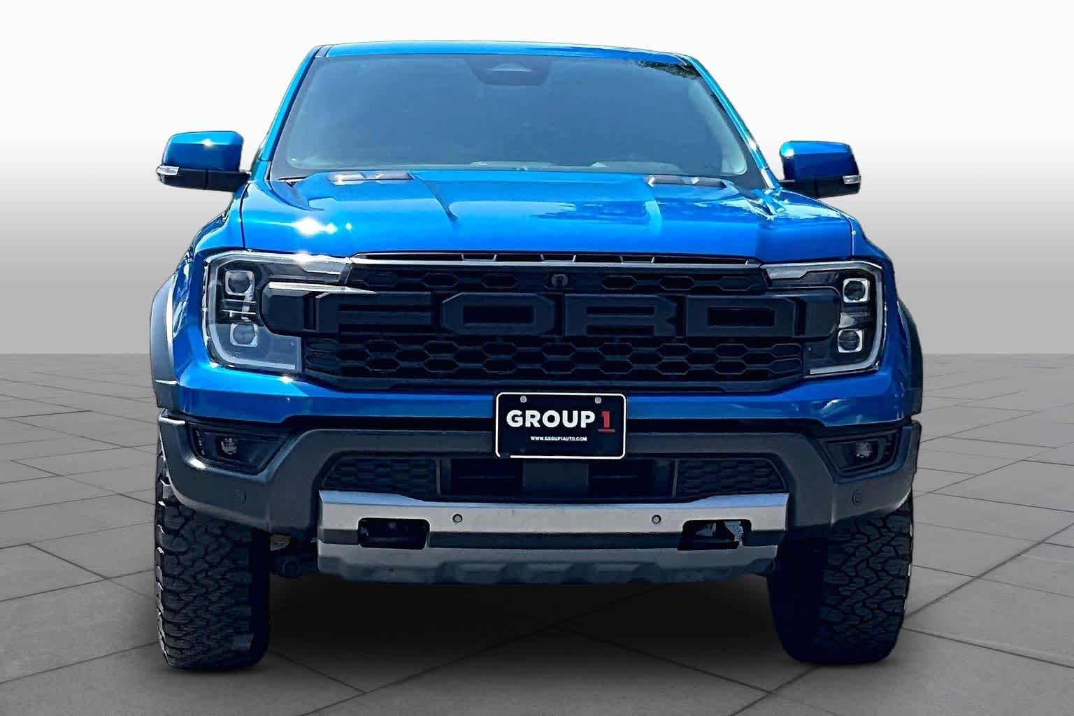 Used 2024 Velocity Blue Metallic Ford Raptor image 4