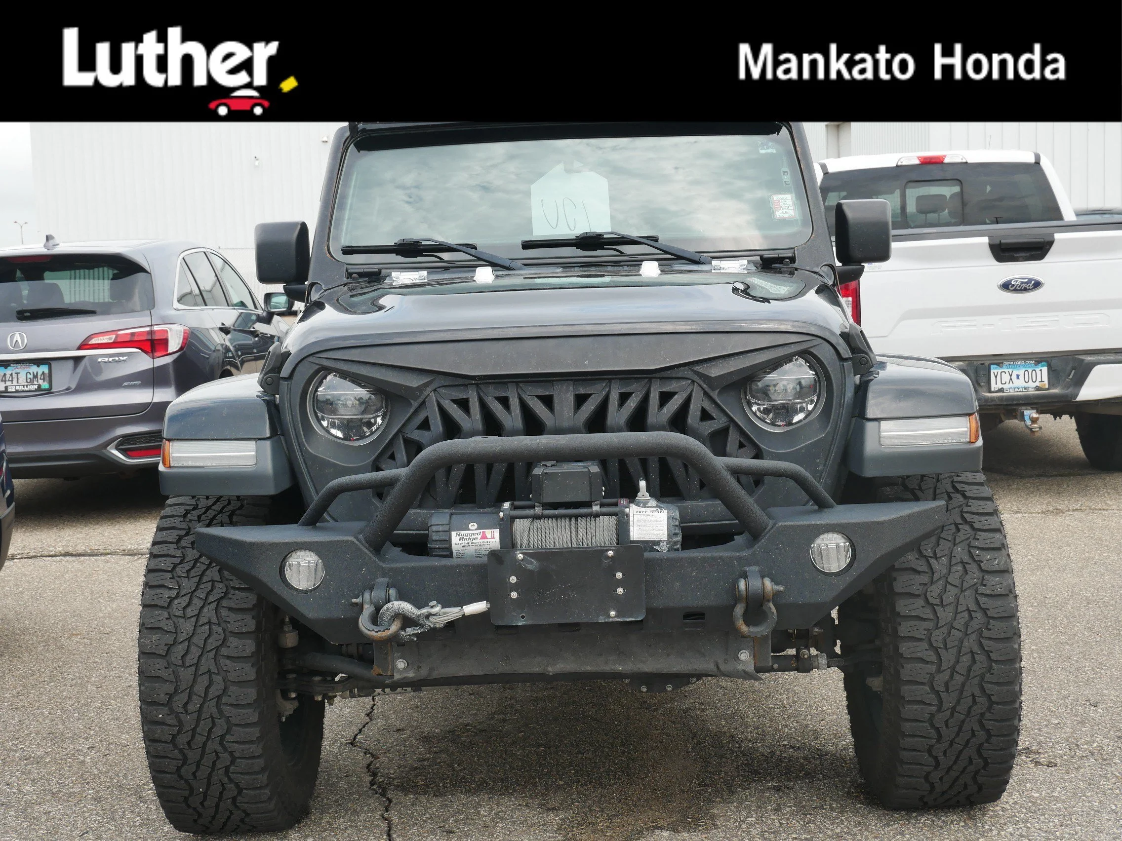 Used 2018 Black Clearcoat Jeep Sahara image 1