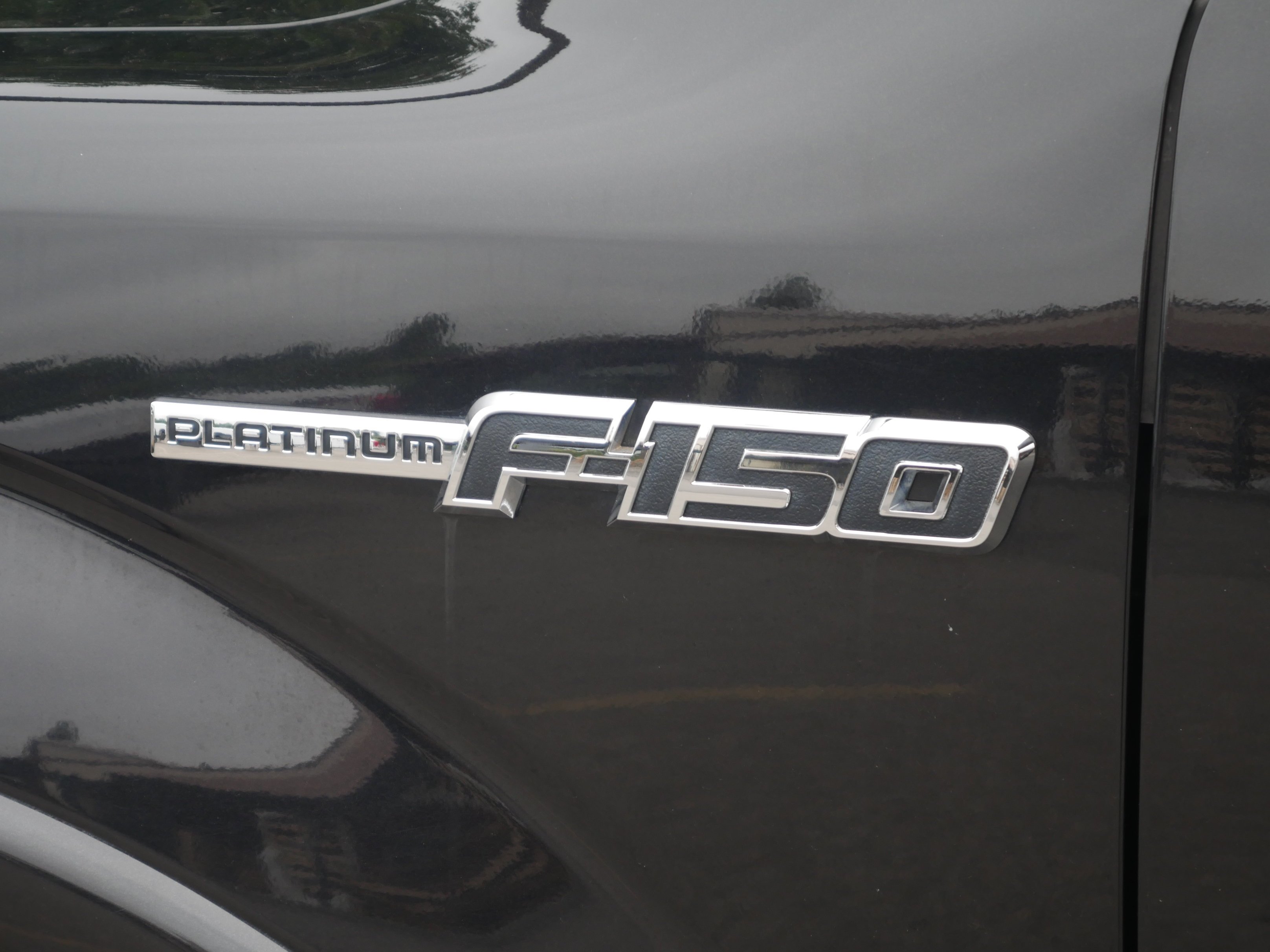 Used 2012 Tuxedo Black Metallic Ford Platinum image 23