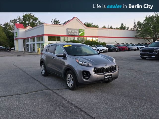 Used 2018 Mineral Silver Kia LX image 1