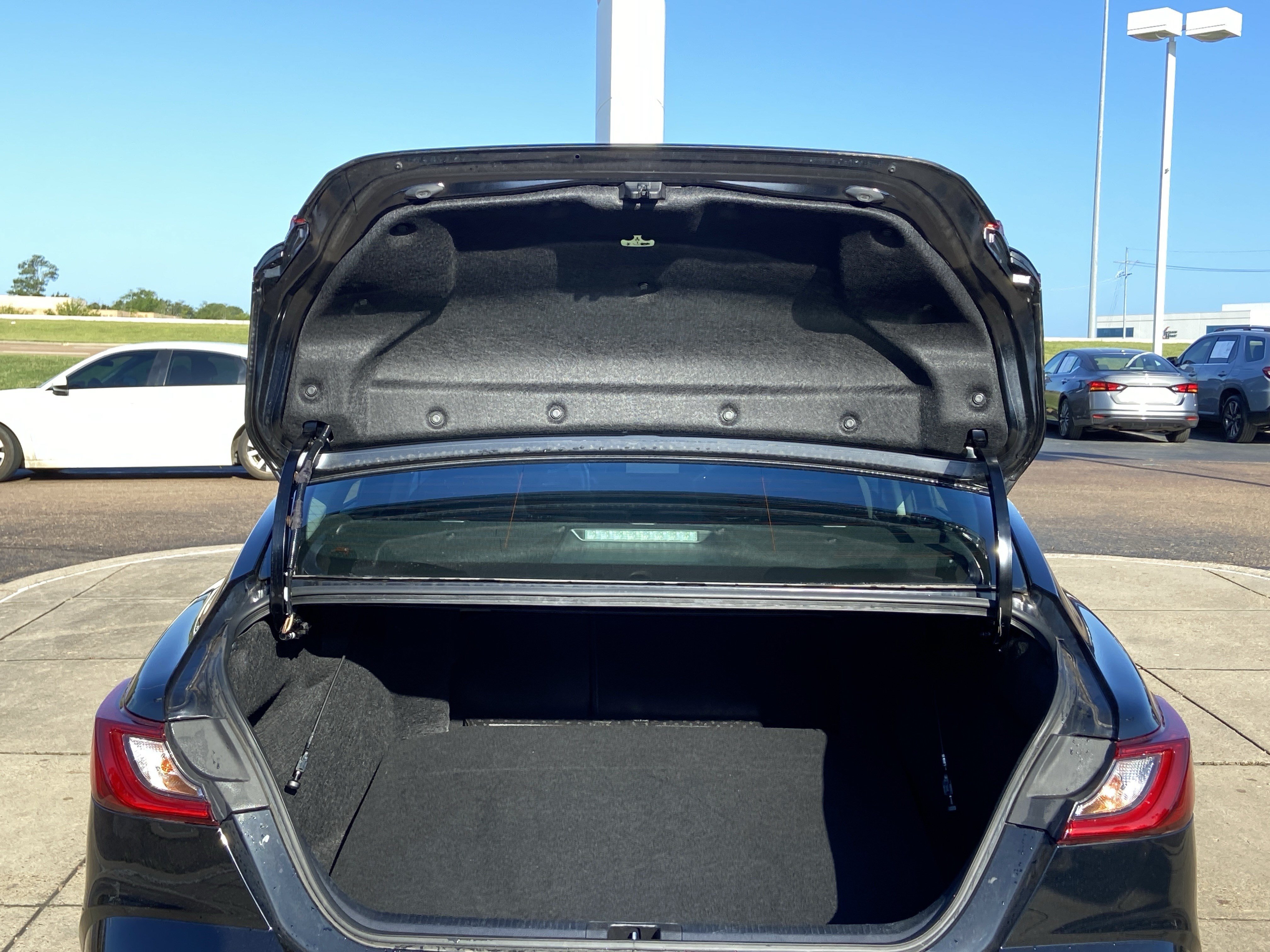 Used 2025 Midnight Black Metallic Toyota LE image 28