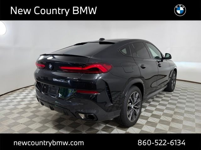 Used 2024 Black Sapphire Metallic BMW xDrive40i image 7