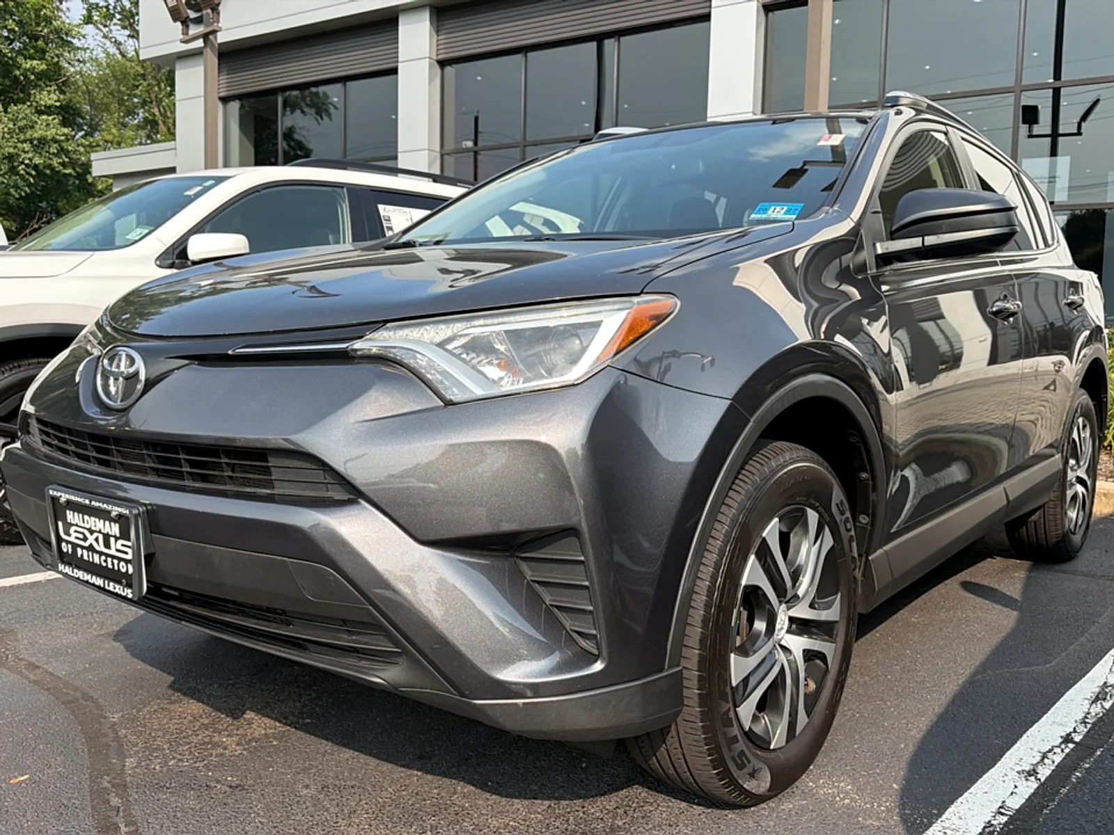 Used 2016 Magnetic Gray Metallic Toyota LE image 2