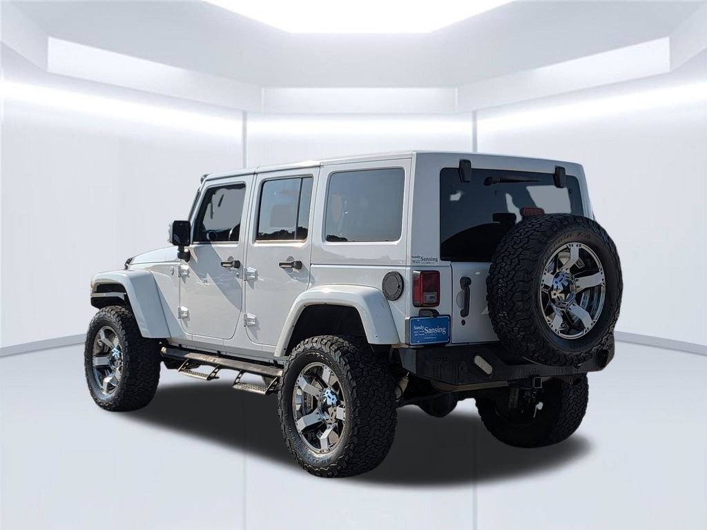 Used 2014 White Jeep Unlimited Sahara image 3