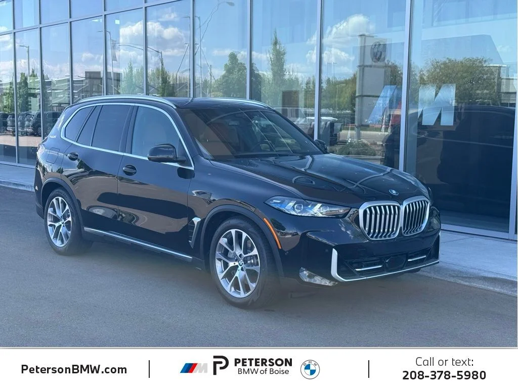 New 2026 Black BMW xDrive50e image 7