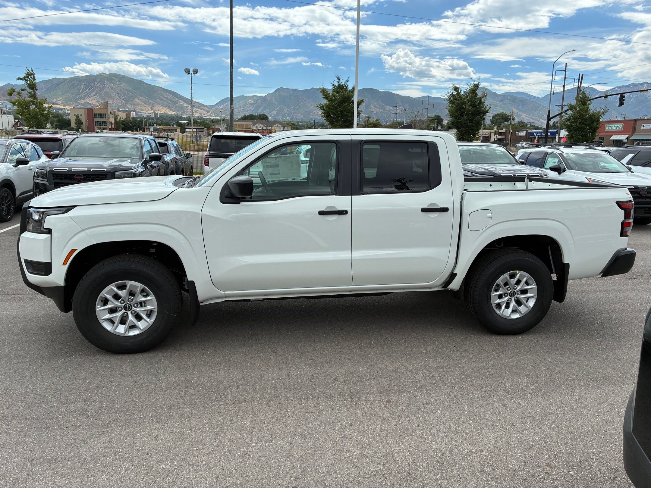 New 2026 Glacier White Nissan Crew Cab S image 7