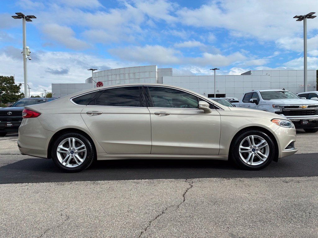 Used 2018 Gold Ford SE image 4