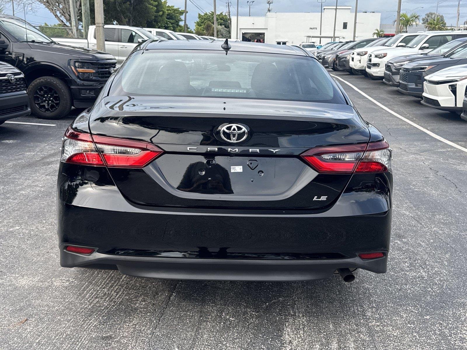 Used 2024 Midnight Black Metallic Toyota LE image 5