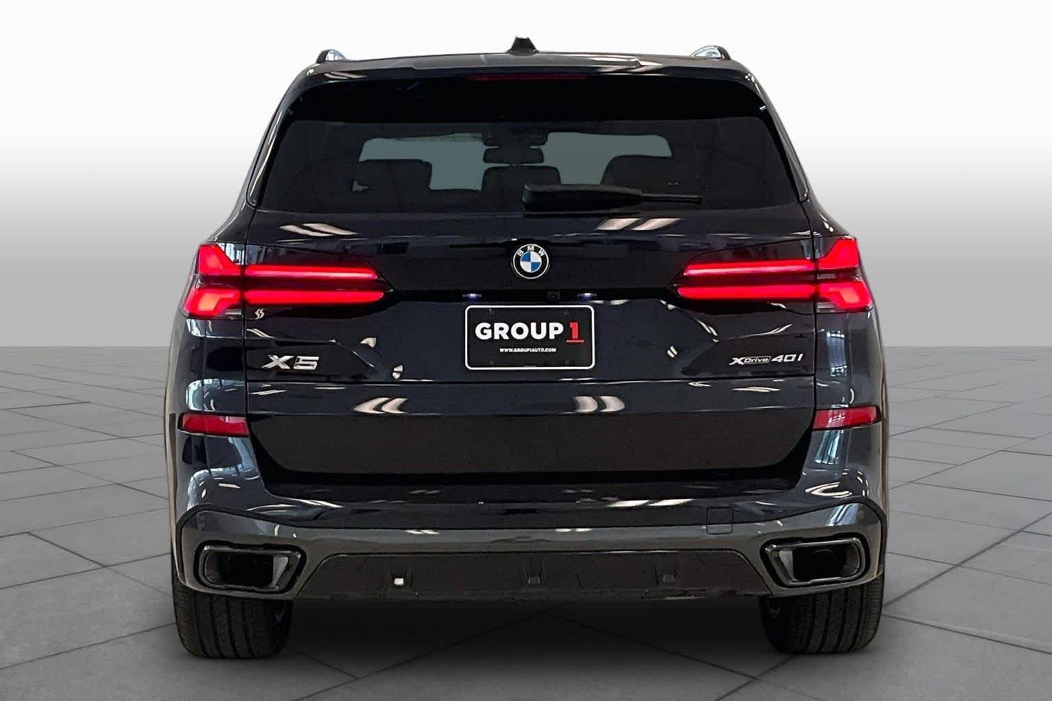 Used 2026 Carbon Black Metallic BMW xDrive40i image 4