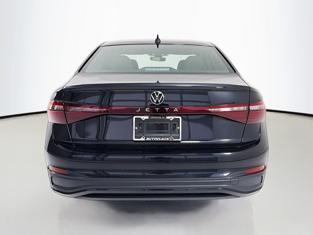 Used 2025 Deep Black Pearl Volkswagen Sport Automatic image 6