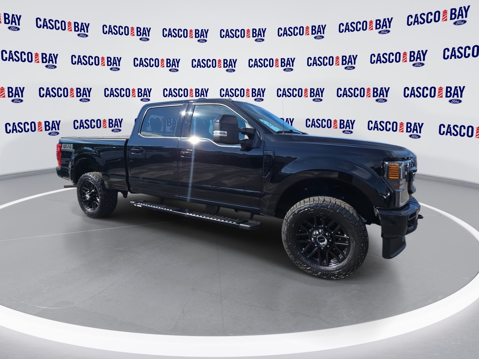 Certified Used 2021 Black Ford Lariat image 1